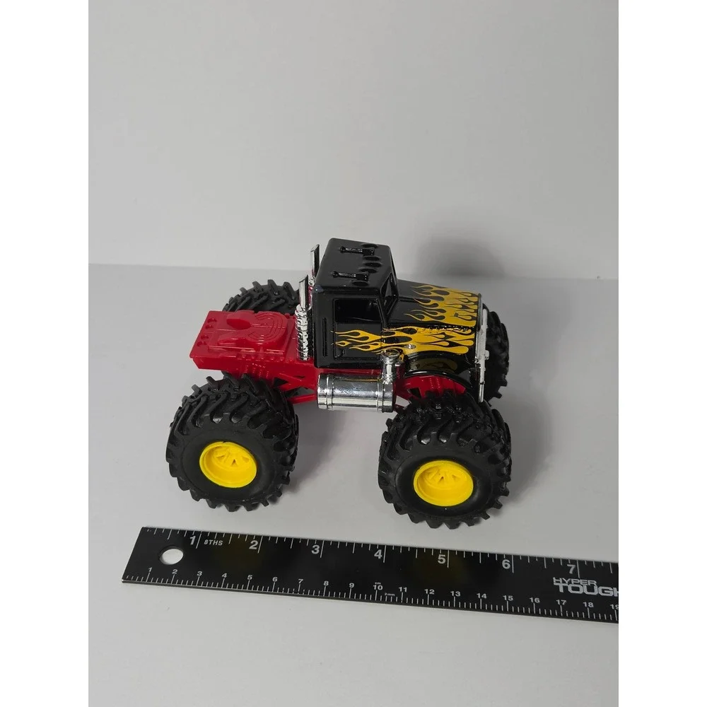 New-Ray Peterbilt Monster Truck Black with Yellow Flames Diecast Toy 5 Inch